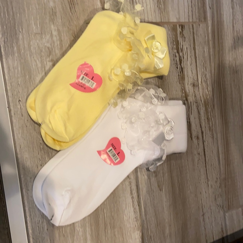 2 pairs one yellow and one white babydoll socks!
